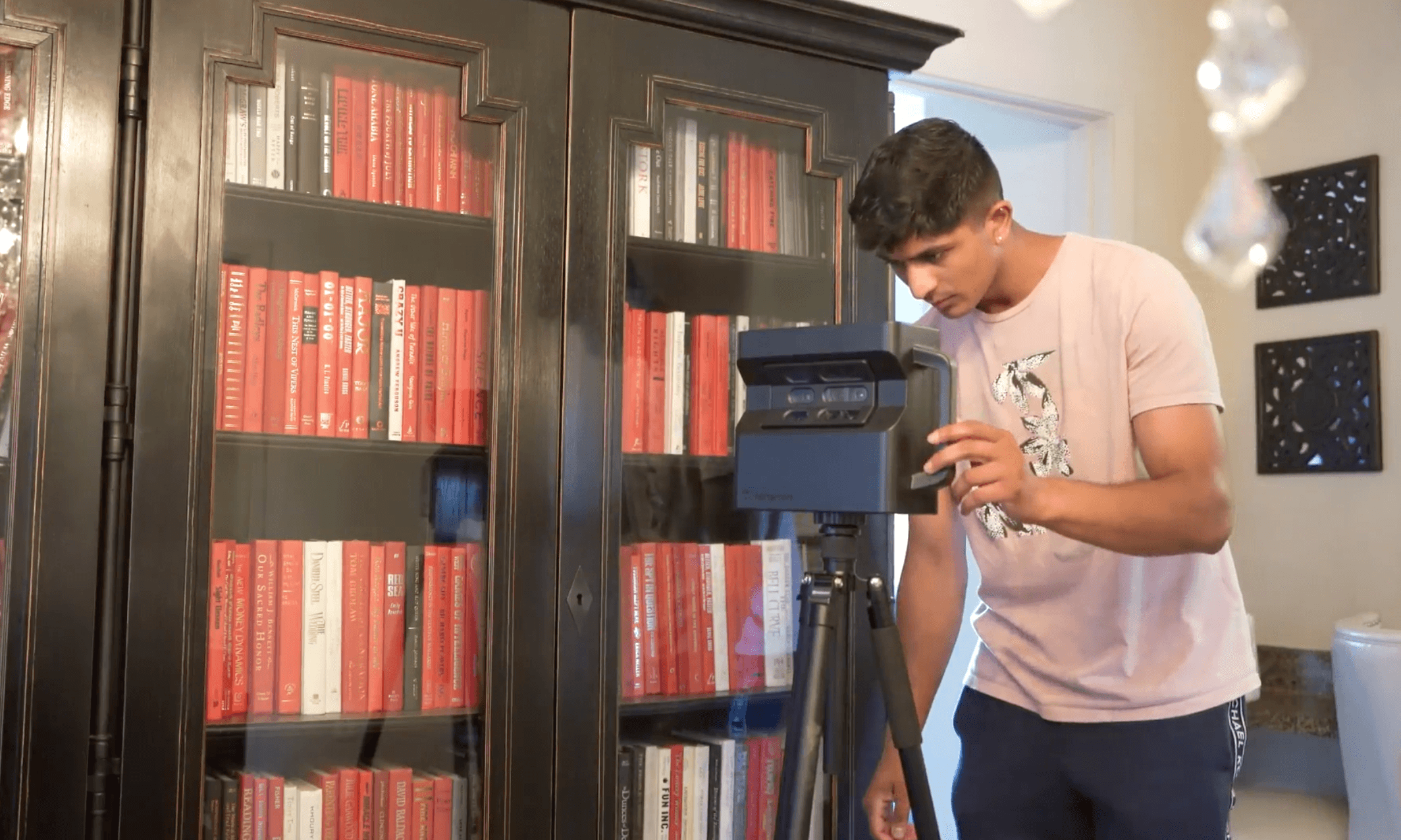 LeaseMagnets creative performing a Matterport scan onsite.